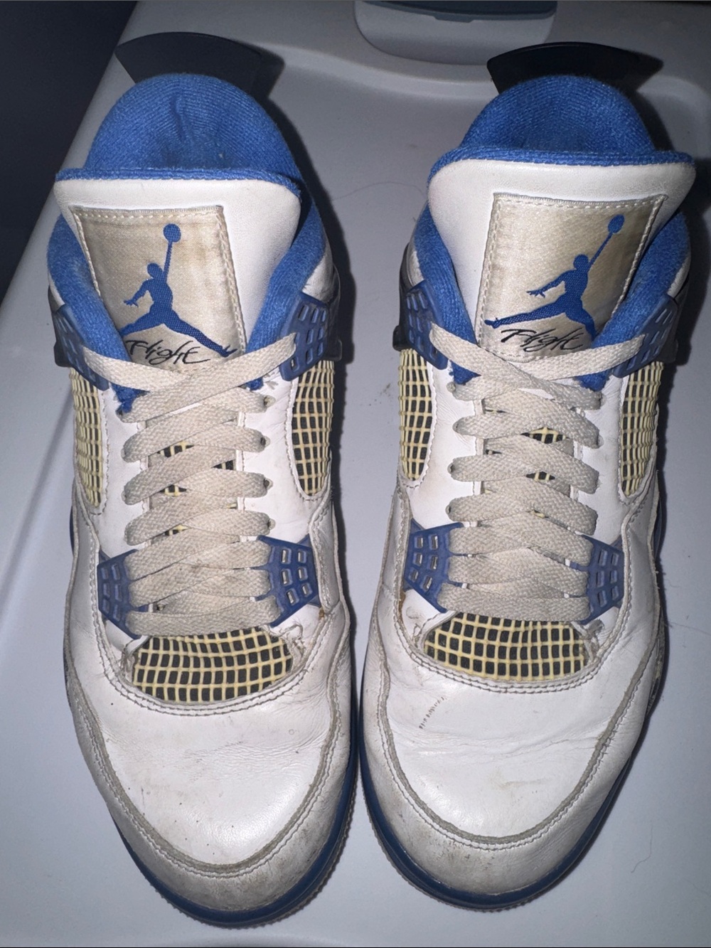 Jordan Retro 4 Sneakers in White, Blue & Gold